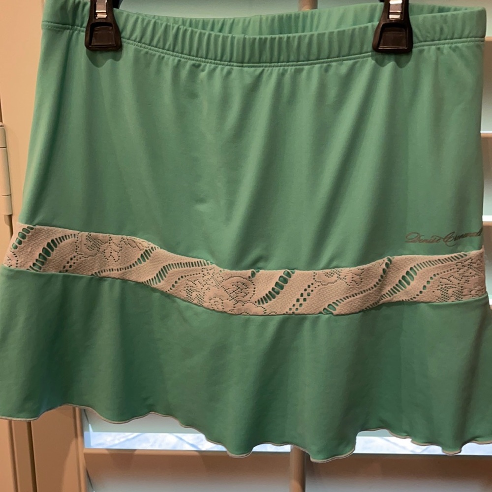 Denise Cronwall mint green tennis skirt.